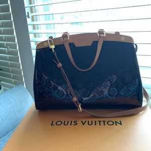 Burgundy medium large size bag .